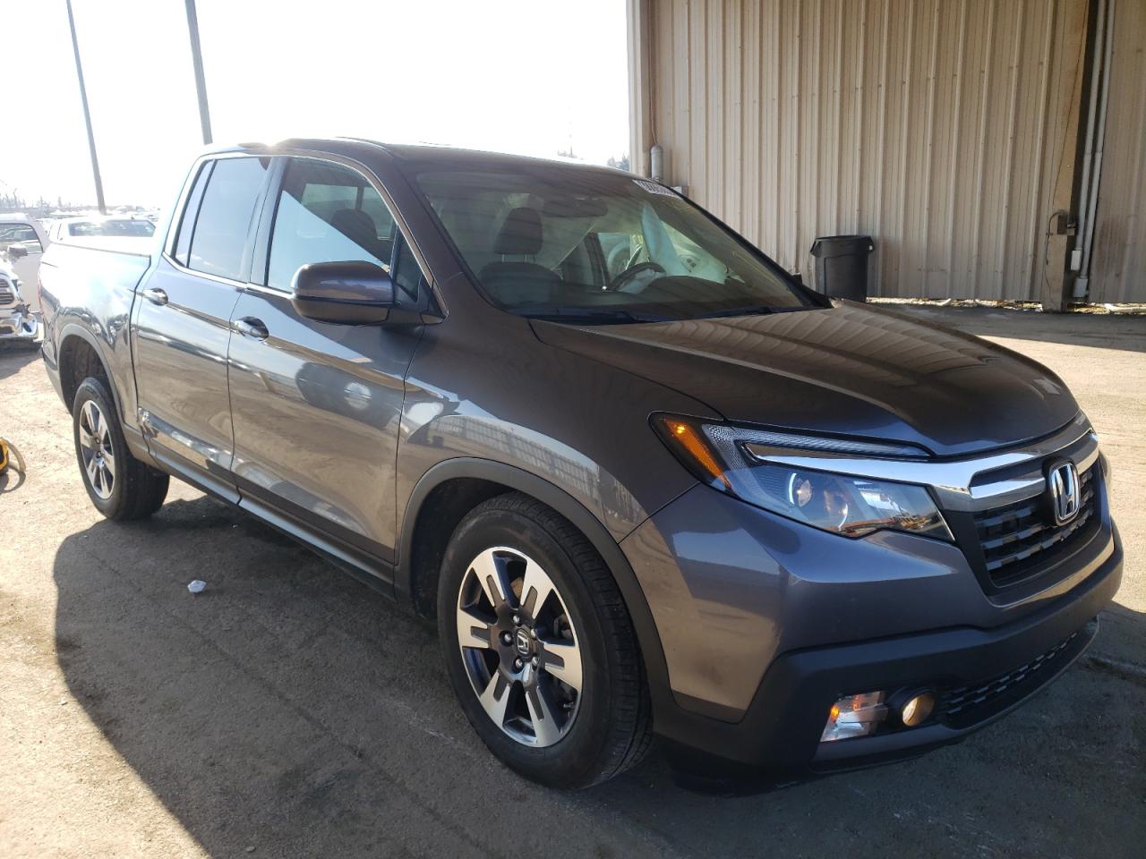 HONDA RIDGELINE 2019 with VIN 5FPYK3F57KB010389 - Photo from auction