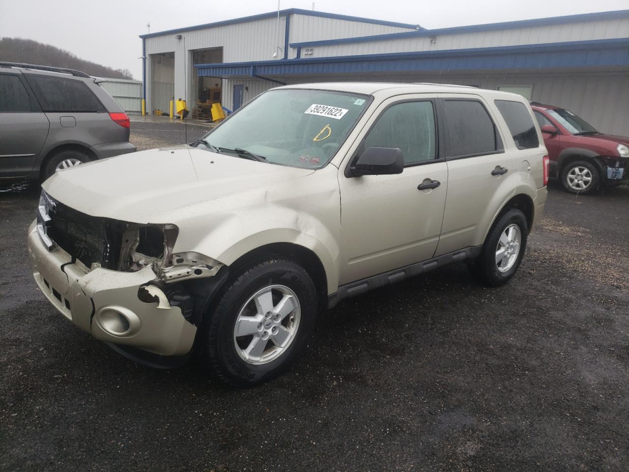 Photo 2 from auction – 2010 FORD ESCAPE XLS with VIN 1FMCU0C79AKD12054