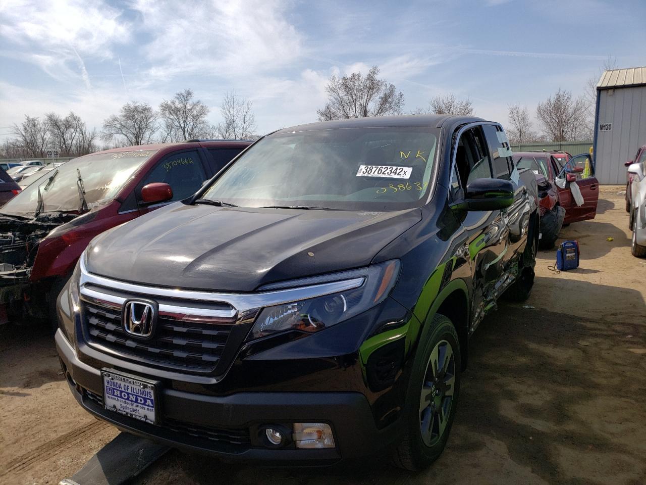 Photo 2 from auction – 2017 HONDA RIDGELINE with VIN 5FPYK3F66HB038637