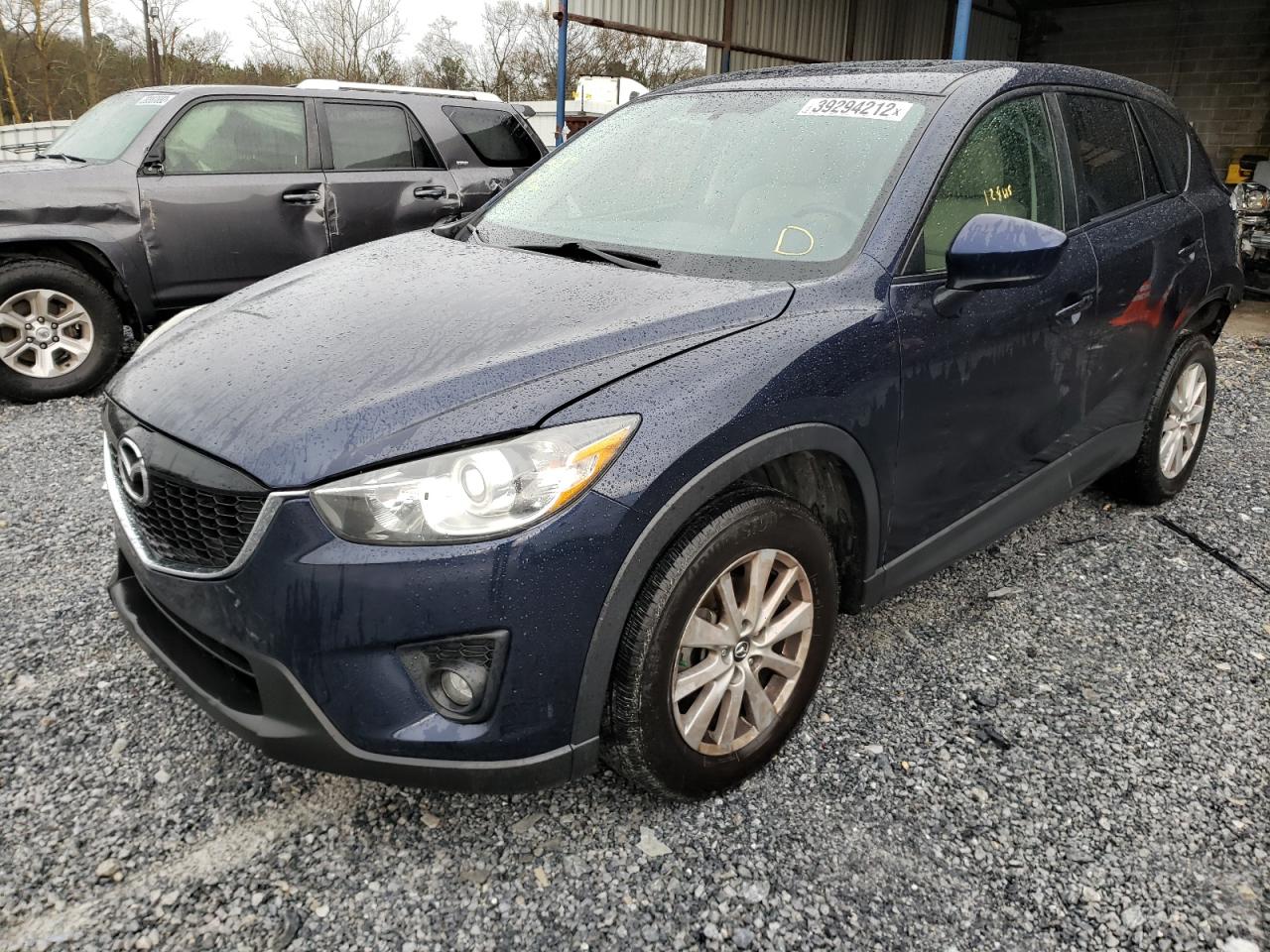 Photo 2 from auction – 2014 MAZDA CX-5 TOURI with VIN JM3KE2CY3E0340538