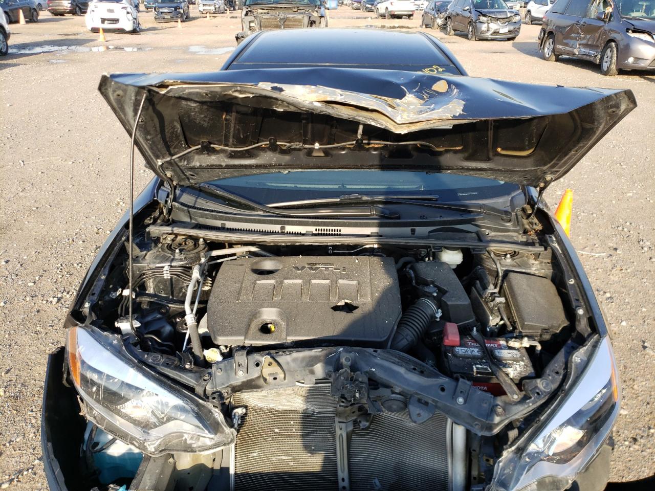 Photo 16 from auction – 2016 TOYOTA COROLLA L with VIN 5YFBURHE7GP561328