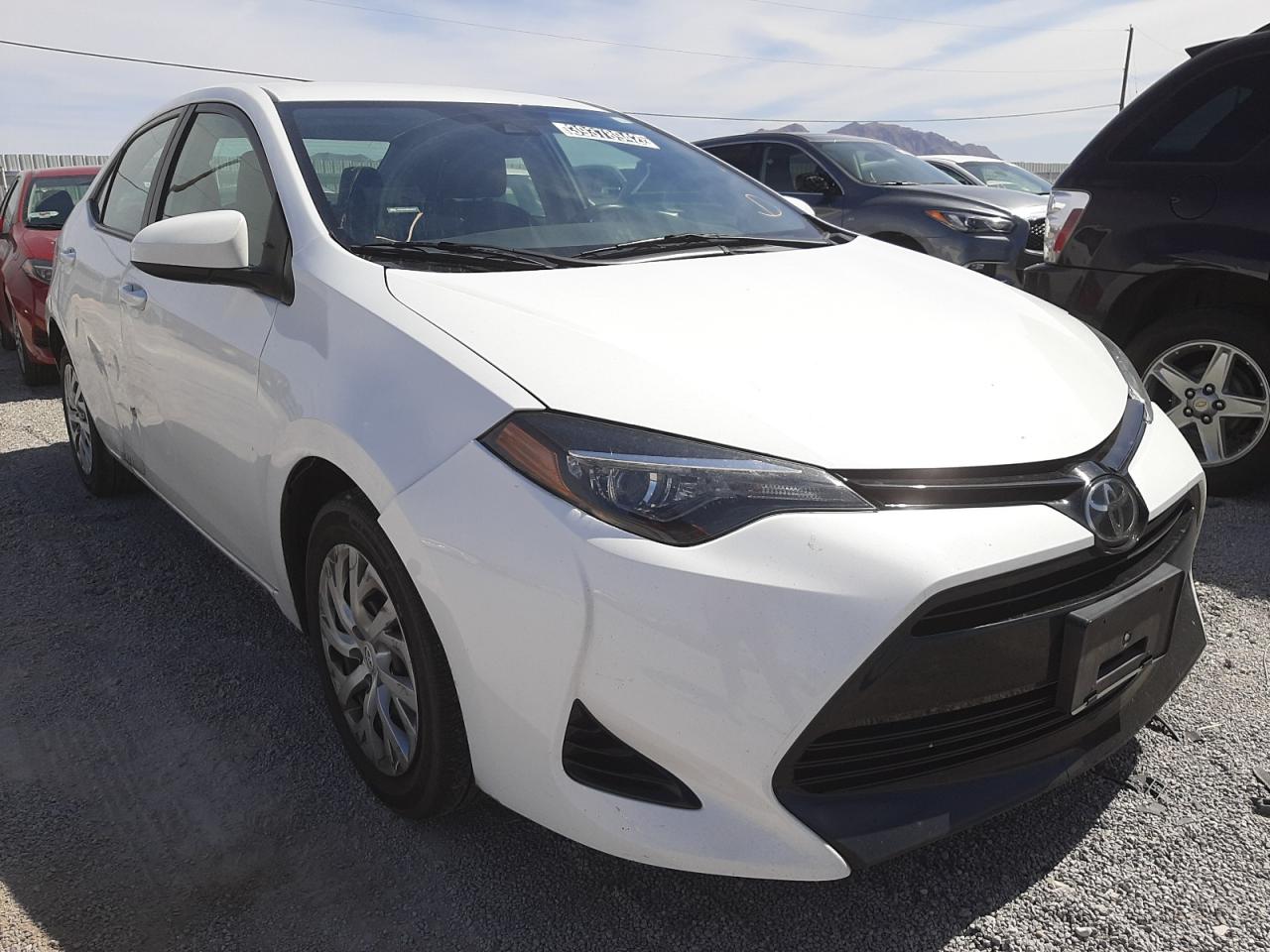 Photo 1 from auction – 2018 TOYOTA COROLLA L with VIN 5YFBURHE3JP830173