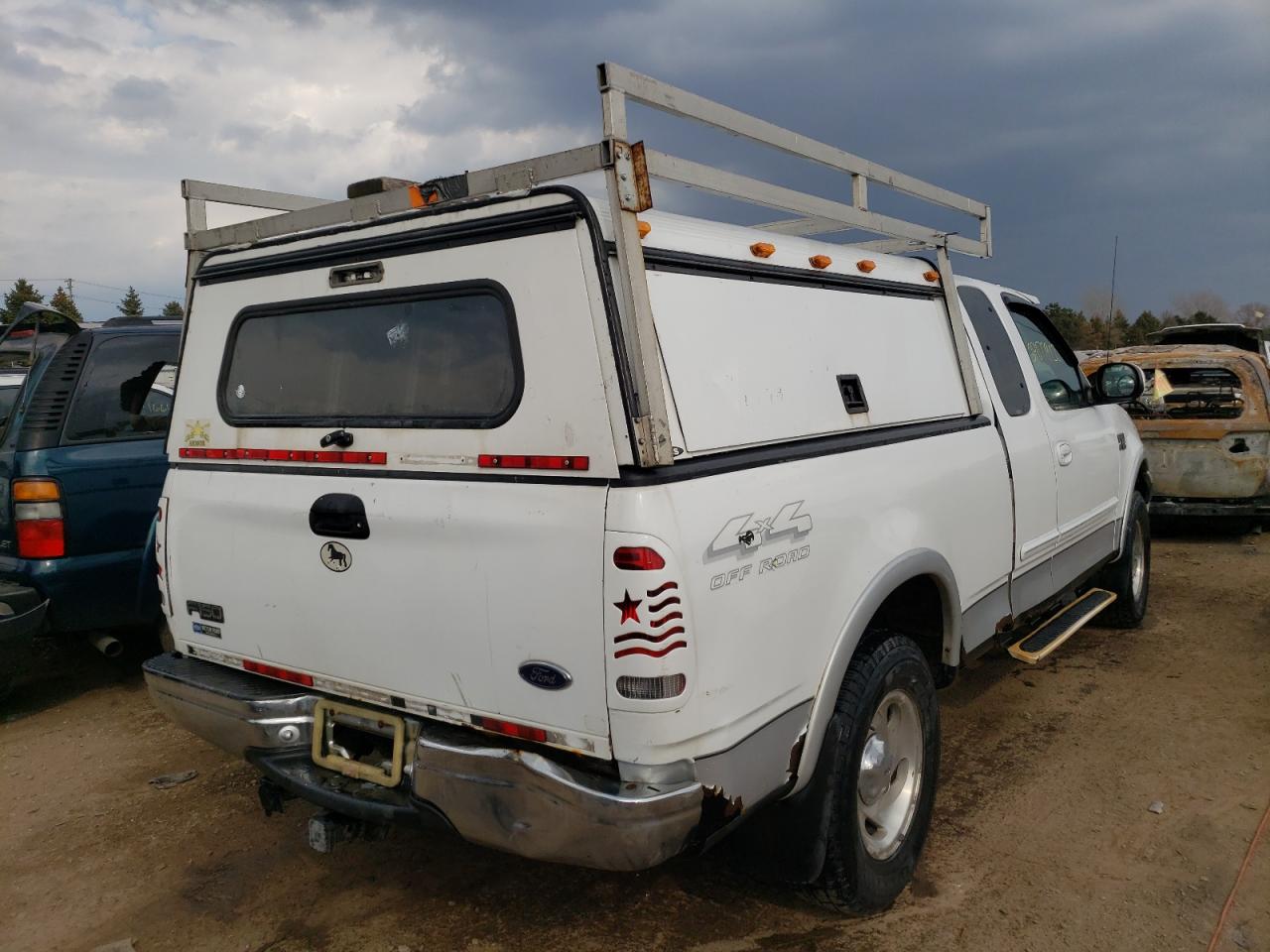 Photo 4 from auction – 2000 FORD F150 with VIN 1FTRX18LXYNB48243