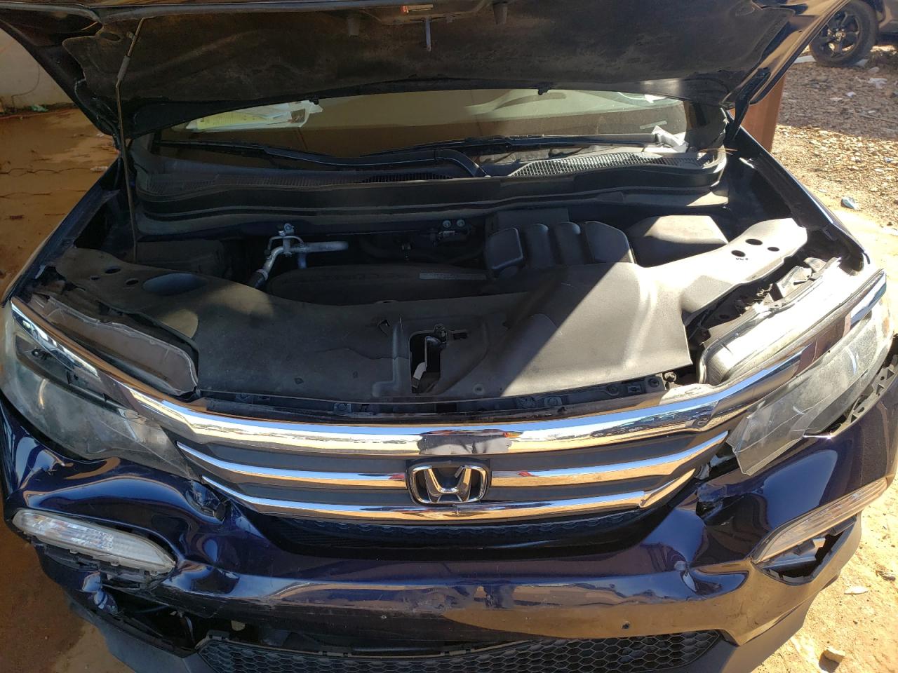 Photo 7 from auction – 2016 HONDA PILOT EXL with VIN 5FNYF6H56GB033469