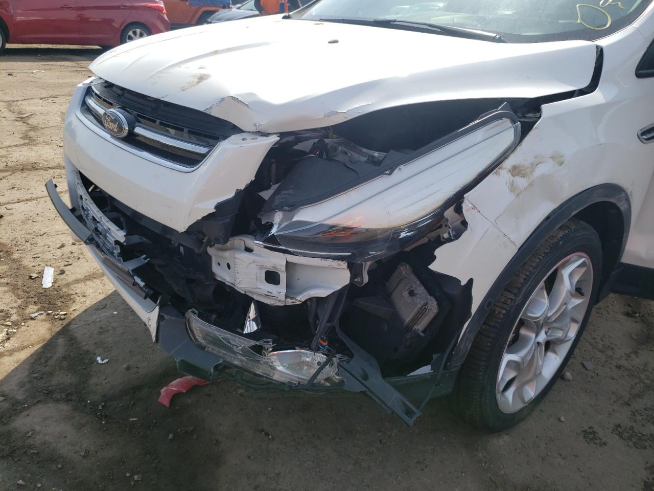 Photo 9 from auction – 2013 FORD ESCAPE TIT with VIN 1FMCU9J97DUB78601