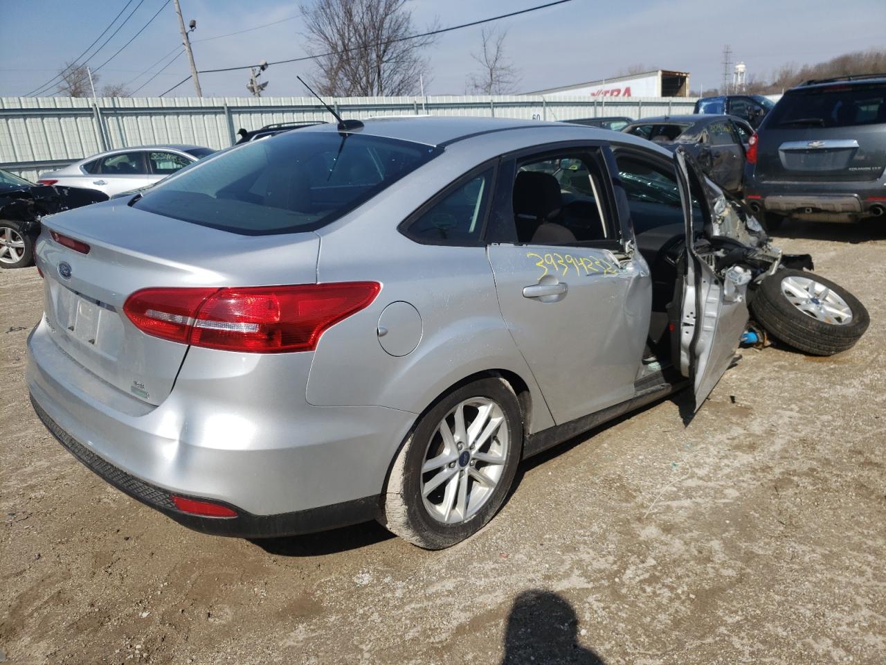 Foto 4 de la subasta – 2018 FORD FOCUS SE con VIN 1FADP3F28JL309194
