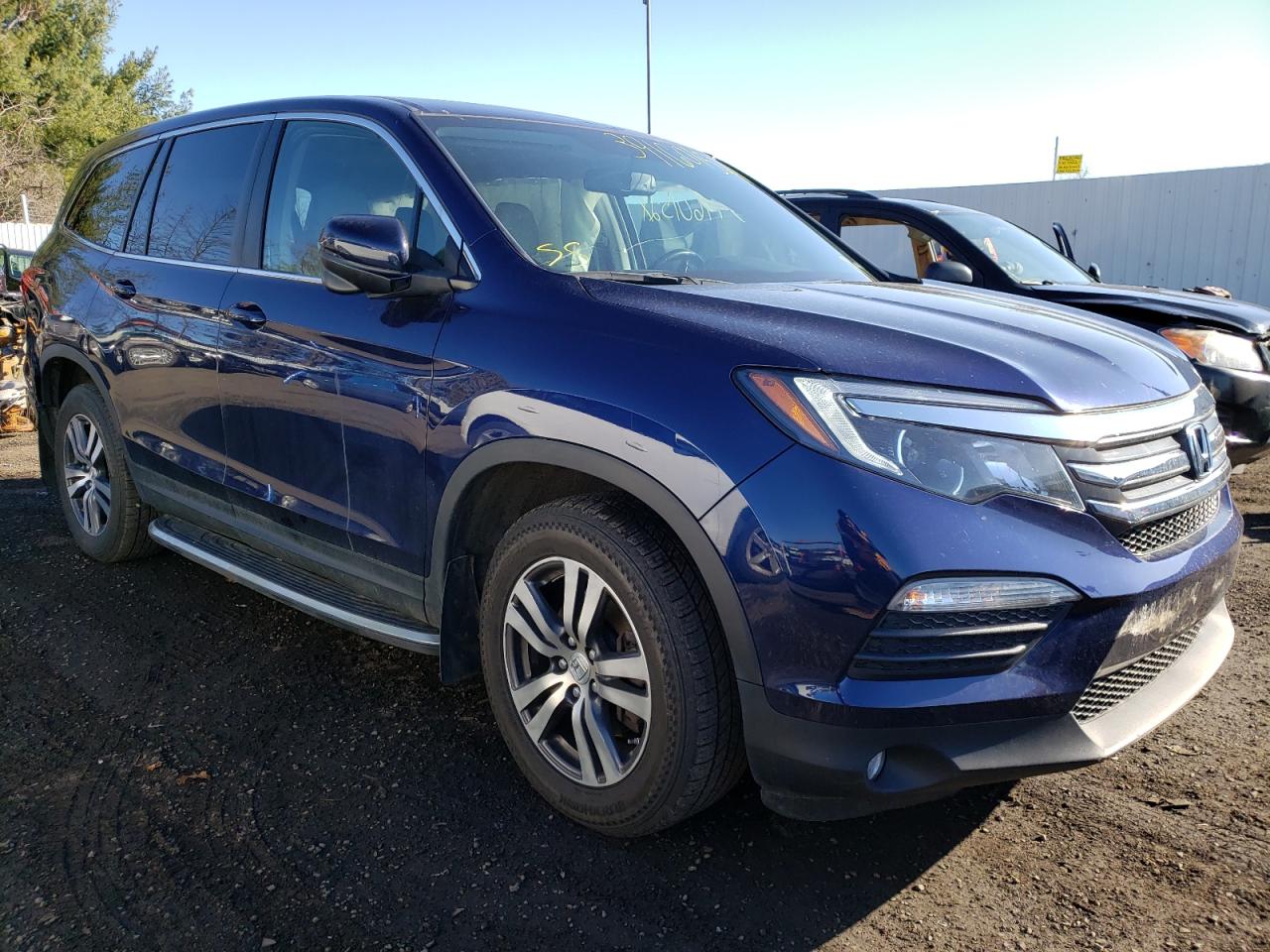 HONDA PILOT EXL 2016 with VIN 5FNYF6H85GB013949 - Photo from auction
