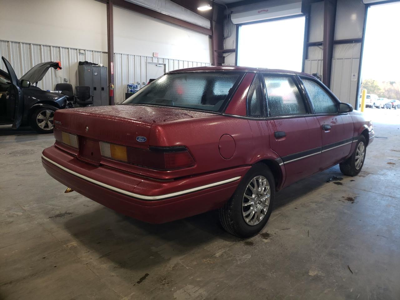 صورة رقم 4 من المزاد - 1990 FORD TEMPO GL مع VIN 2FAPP36X7LB157422