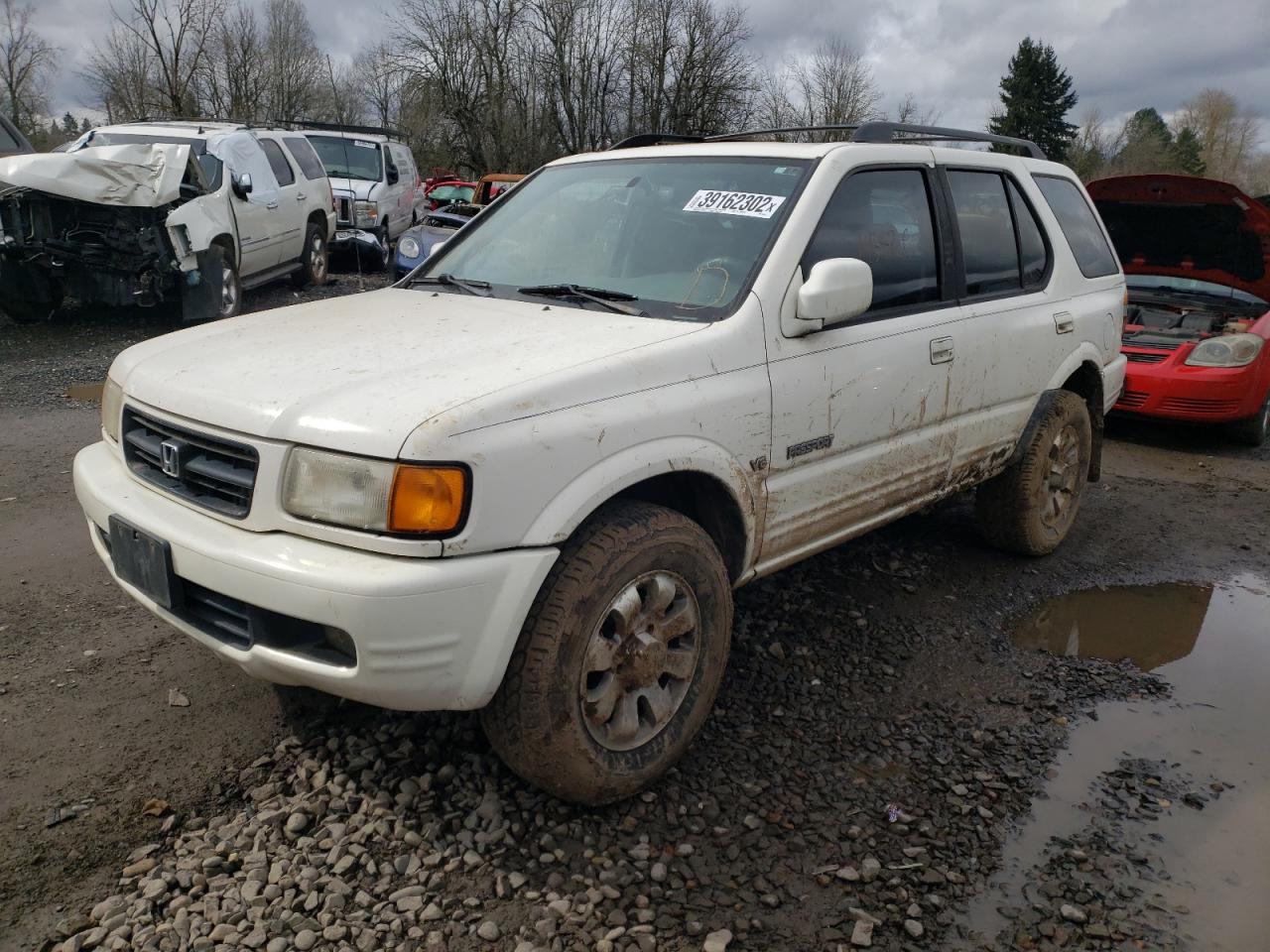 Photo 2 from auction – 1998 HONDA PASSPORT E with VIN 4S6CM58W5W4415097