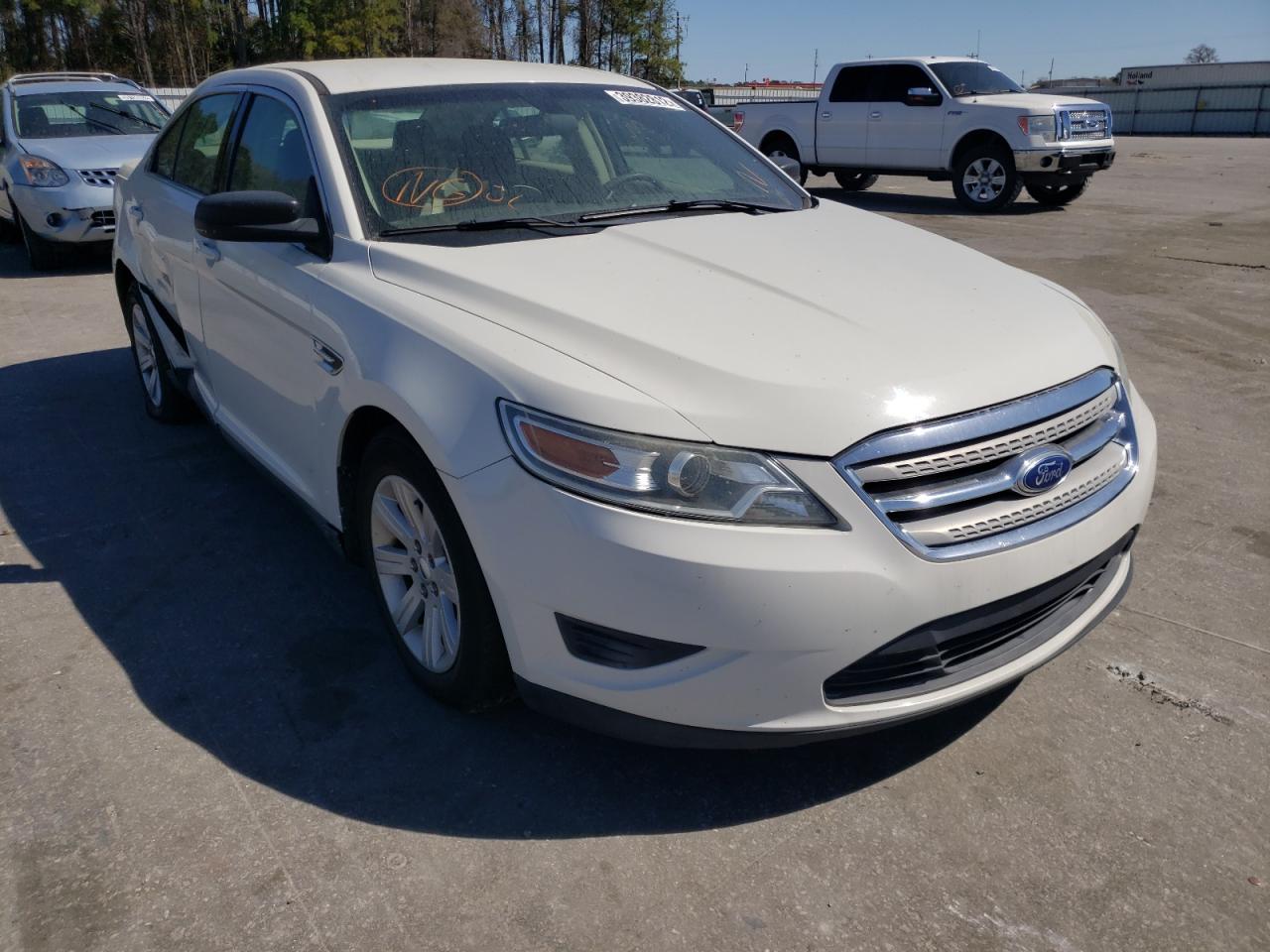 FORD TAURUS SE 2011 with VIN 1FAHP2DW3BG188425 - Photo from auction