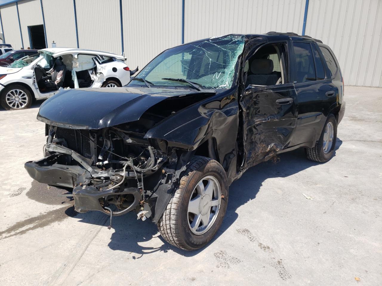 Photo 2 from auction – 2002 GMC ENVOY with VIN 1GKDS13S822508761