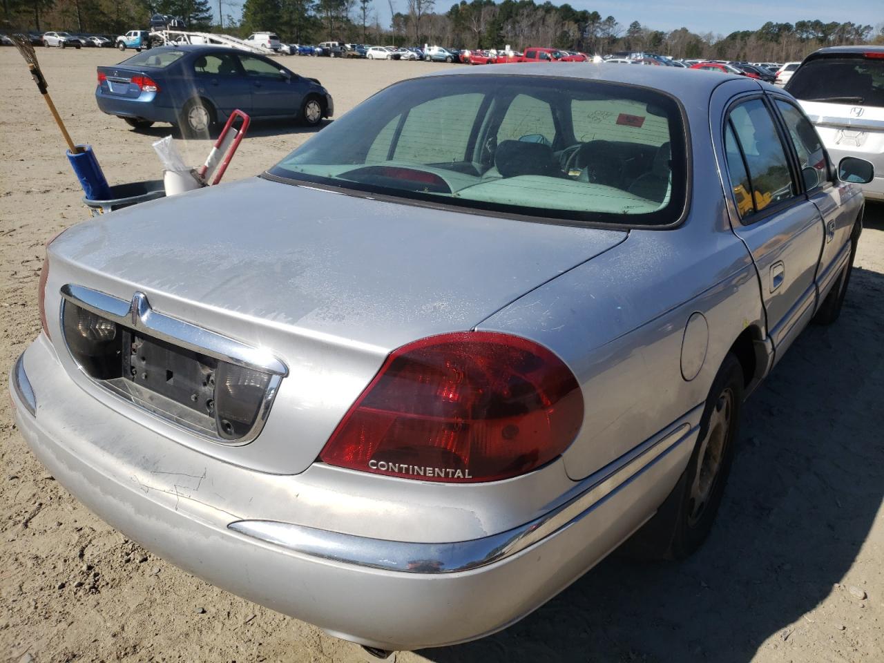 Photo 4 from auction – 1998 LINCOLN CONTINENTA with VIN 1LNFM97VXWY676871