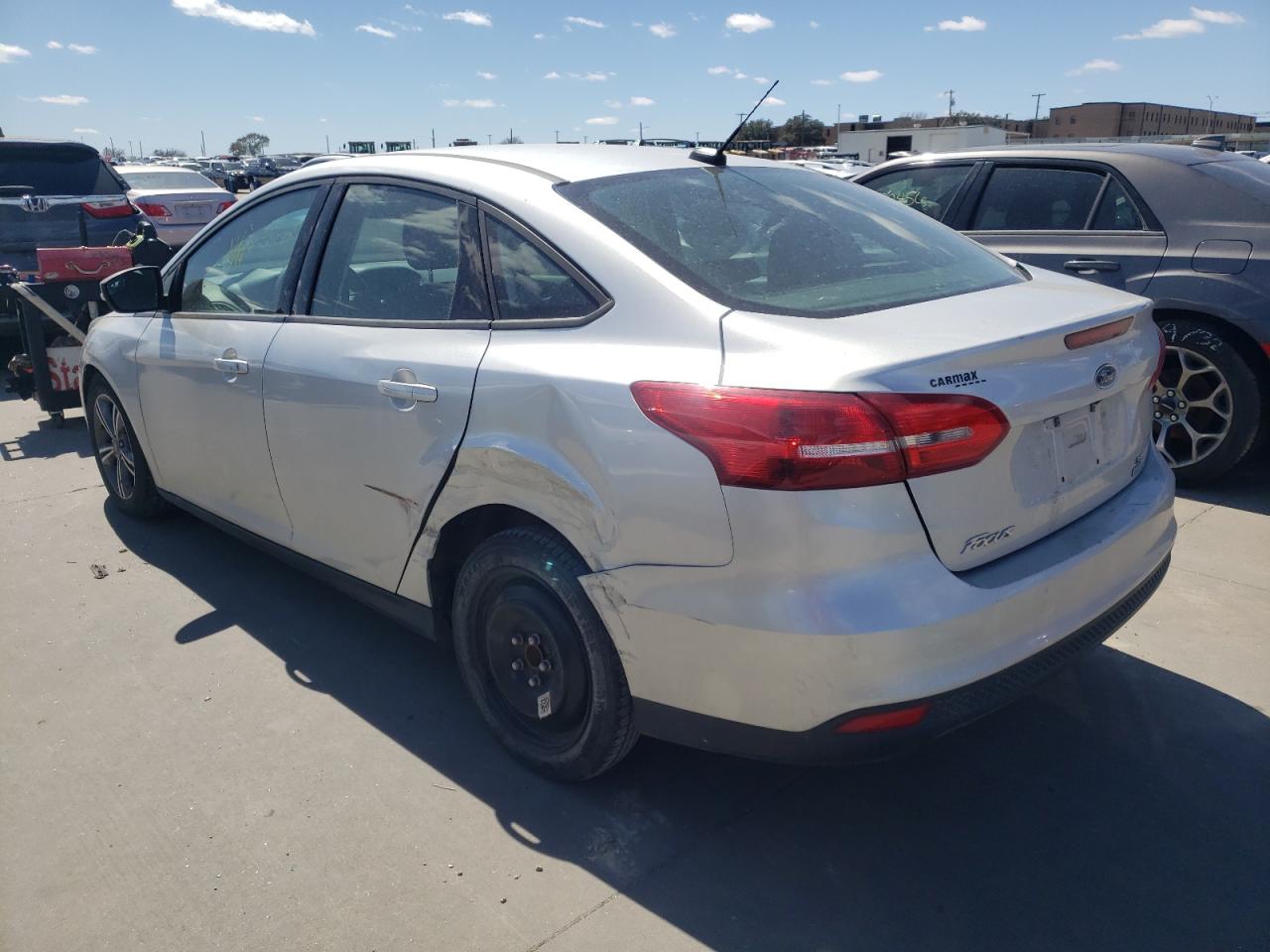 Photo 3 from auction – 2016 FORD FOCUS SE with VIN 1FADP3FE8GL359855