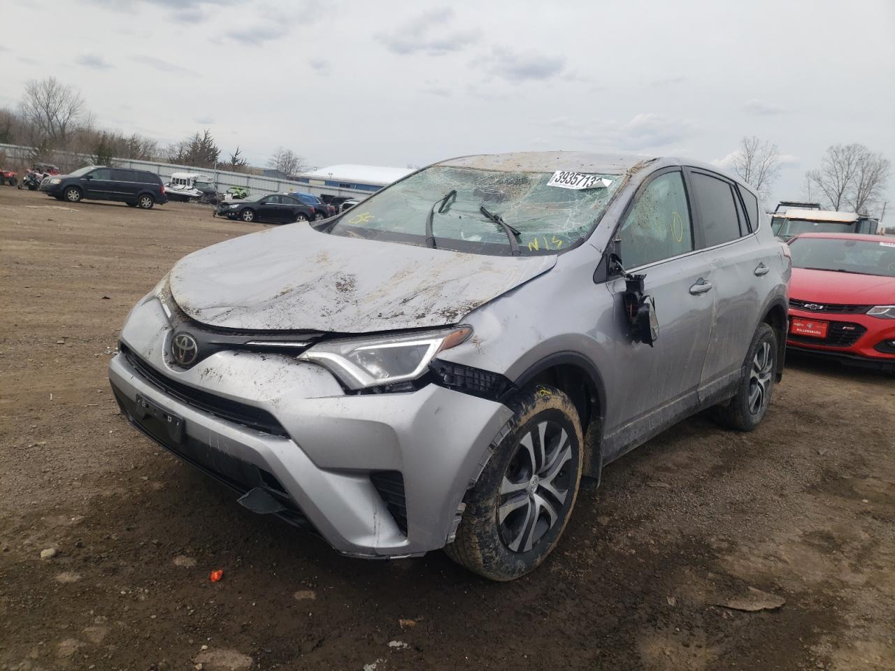 Photo 2 from auction – 2018 TOYOTA RAV4 LE with VIN 2T3BFREV0JW711422