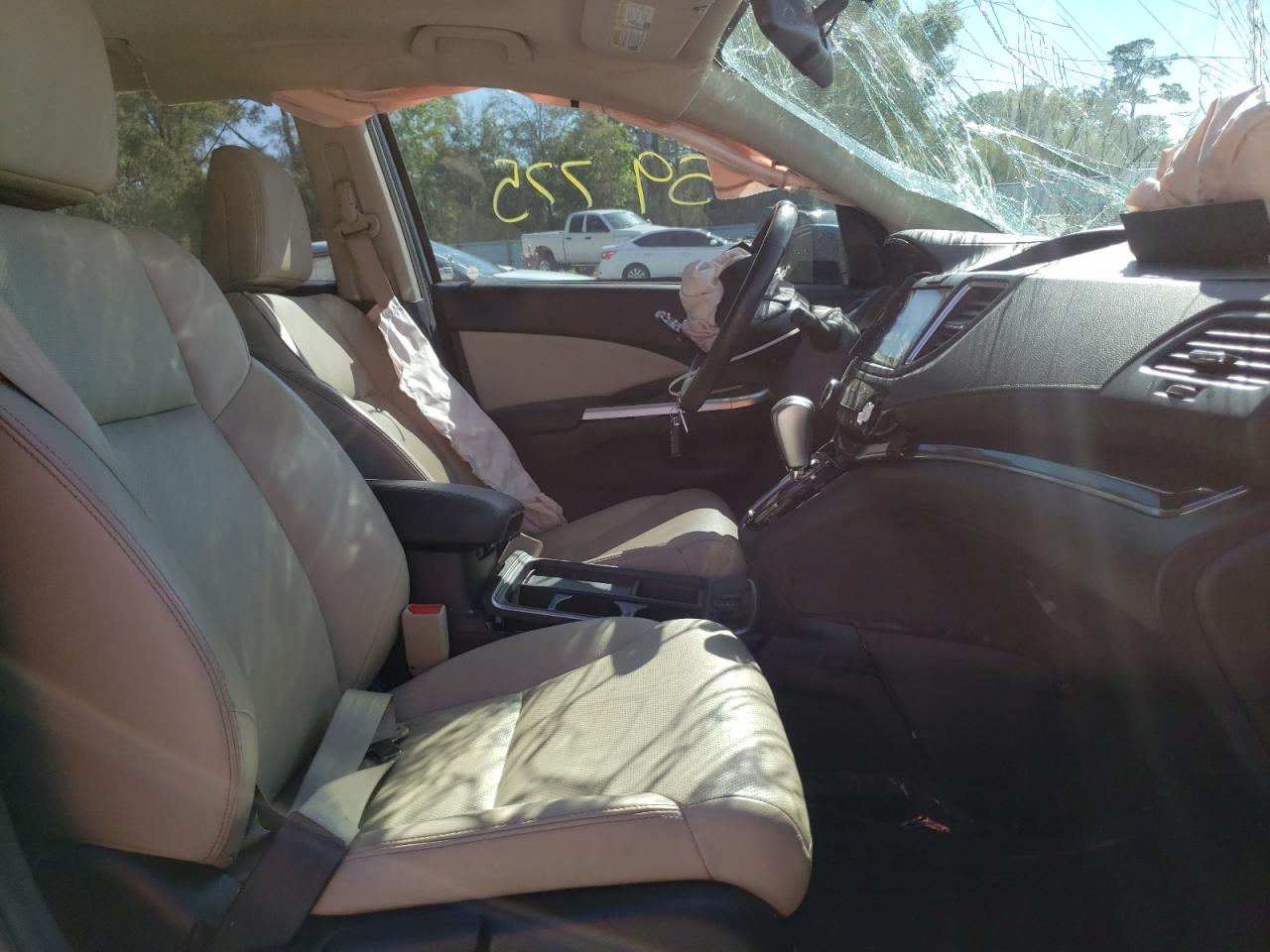Photo 5 from auction – 2016 HONDA CR-V EXL with VIN 2HKRM3H71GH527783