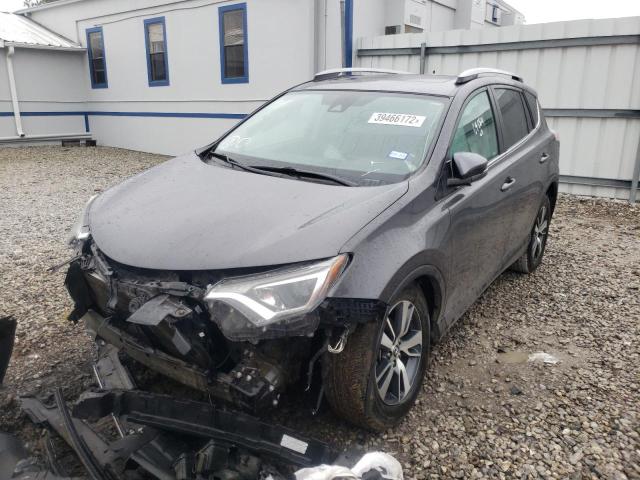 Photo 2 from auction – 2017 TOYOTA RAV4 XLE with VIN 2T3RFREV8HW600514