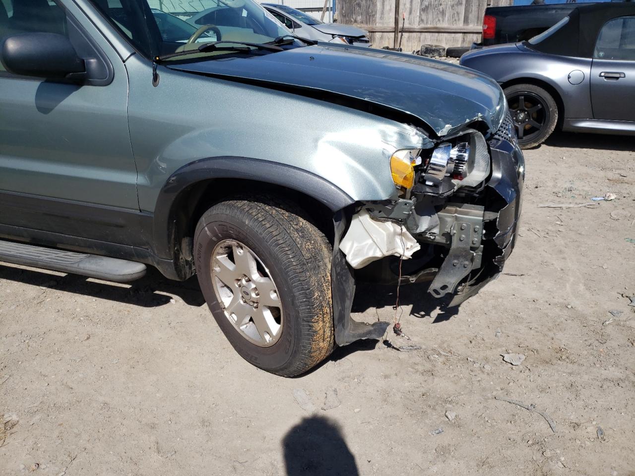 Photo 9 from auction – 2006 FORD ESCAPE XLT with VIN 1FMCU031X6KC04013
