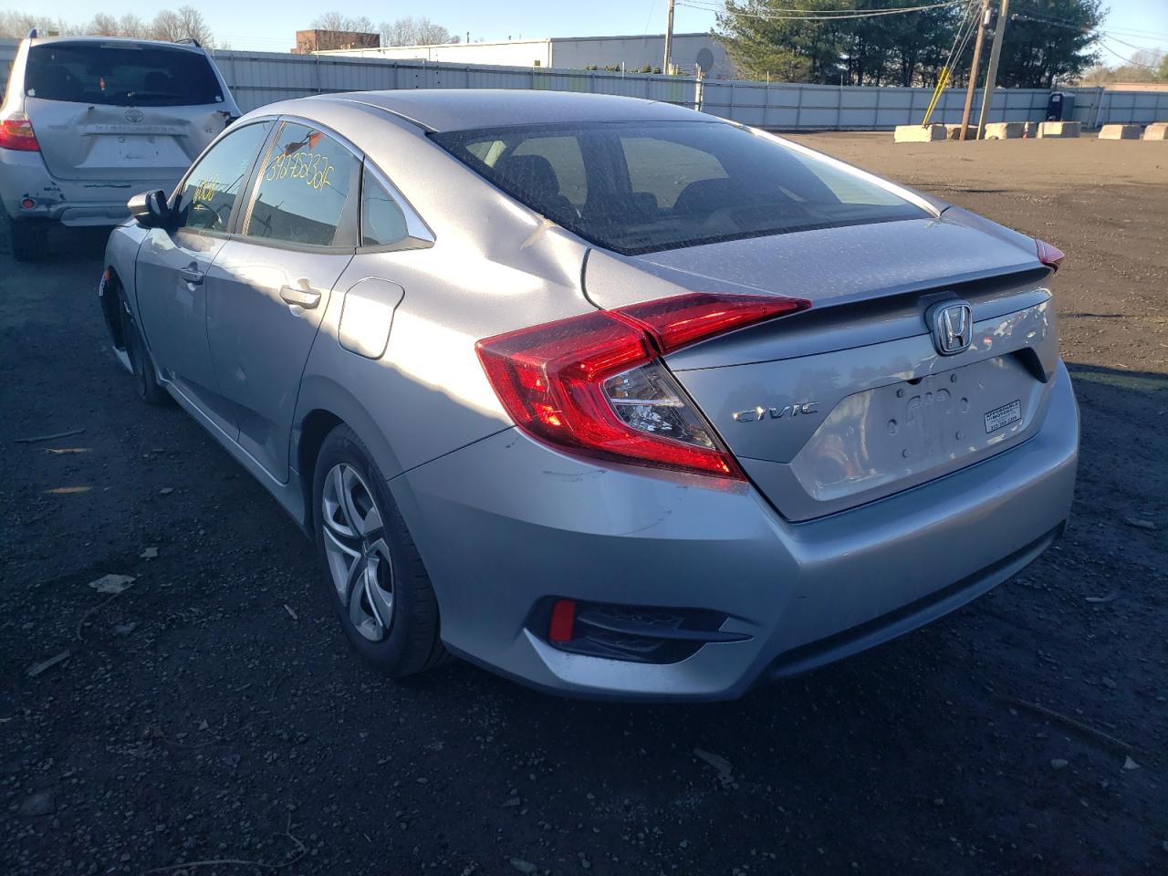 Photo 3 from auction – 2017 HONDA CIVIC LX with VIN 19XFC2F52HE230500