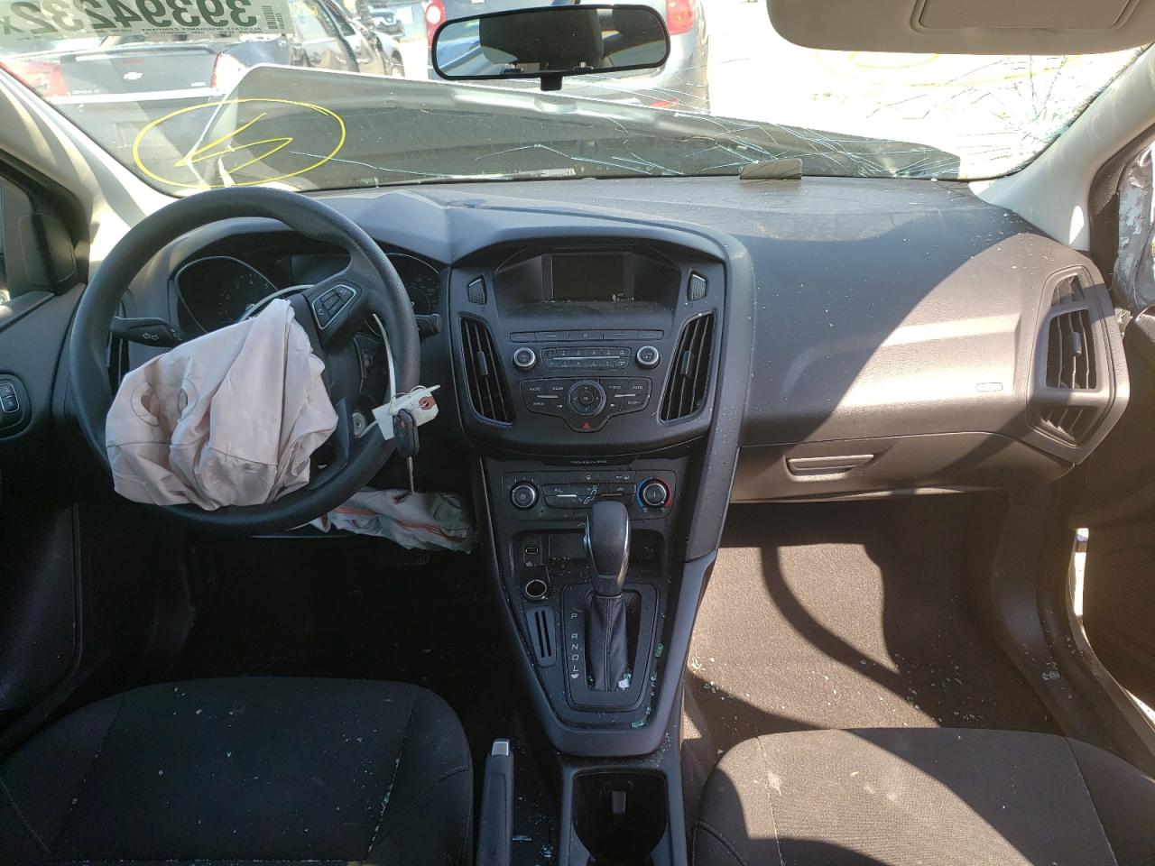 Foto 9 de la subasta – 2018 FORD FOCUS SE con VIN 1FADP3F28JL309194