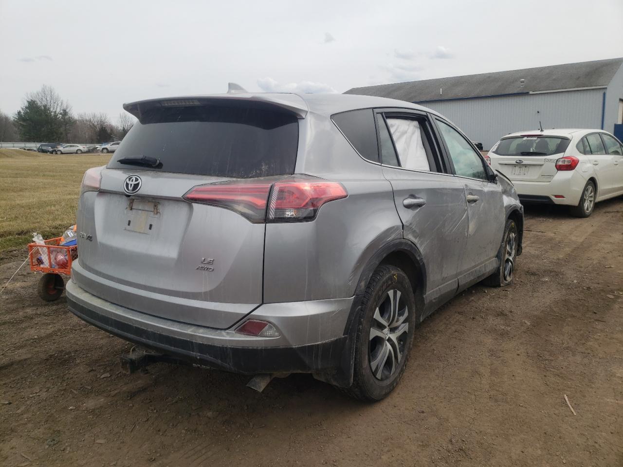 Photo 4 from auction – 2018 TOYOTA RAV4 LE with VIN 2T3BFREV0JW711422