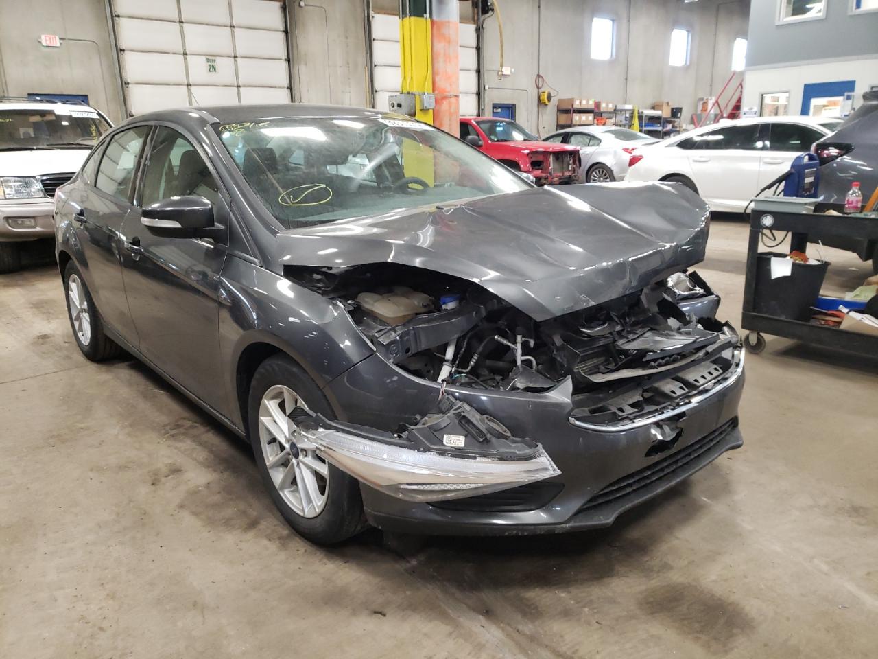 FORD FOCUS SE 2017 with VIN 1FADP3F20HL277240 - Photo from auction