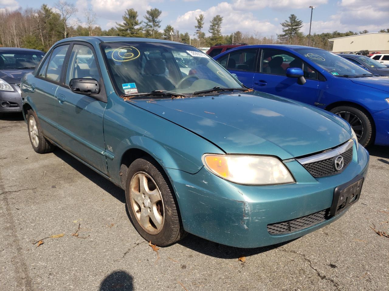 MAZDA PROTEGE LX 2001 with VIN JM1BJ225810478775 - Photo from auction