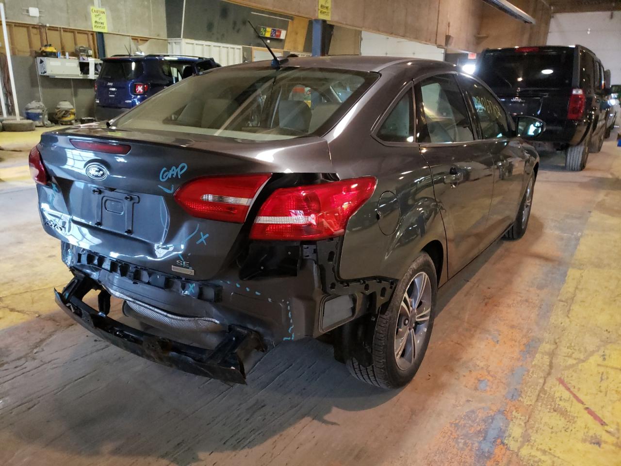 Photo 4 from auction – 2017 FORD FOCUS SE with VIN 1FADP3FEXHL310240