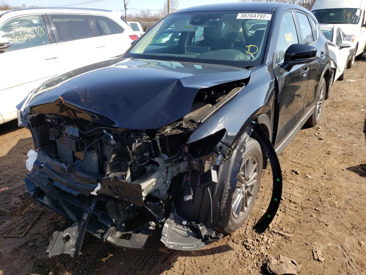 Photo 2 from auction – 2021 MAZDA CX-5 SPORT with VIN JM3KFBBM0M0397340
