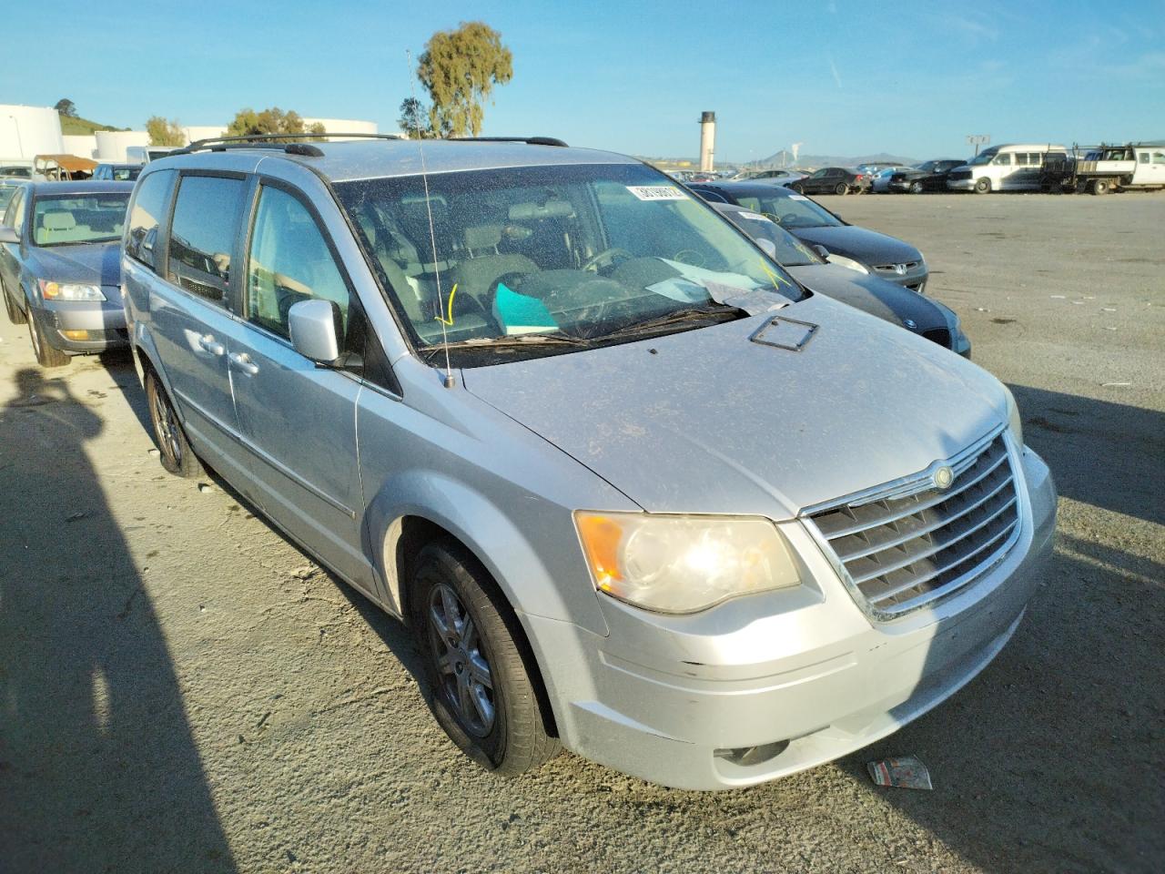 CHRYSLER TOWN & COU 2010 with VIN 2A4RR5D11AR214185 - Photo from auction