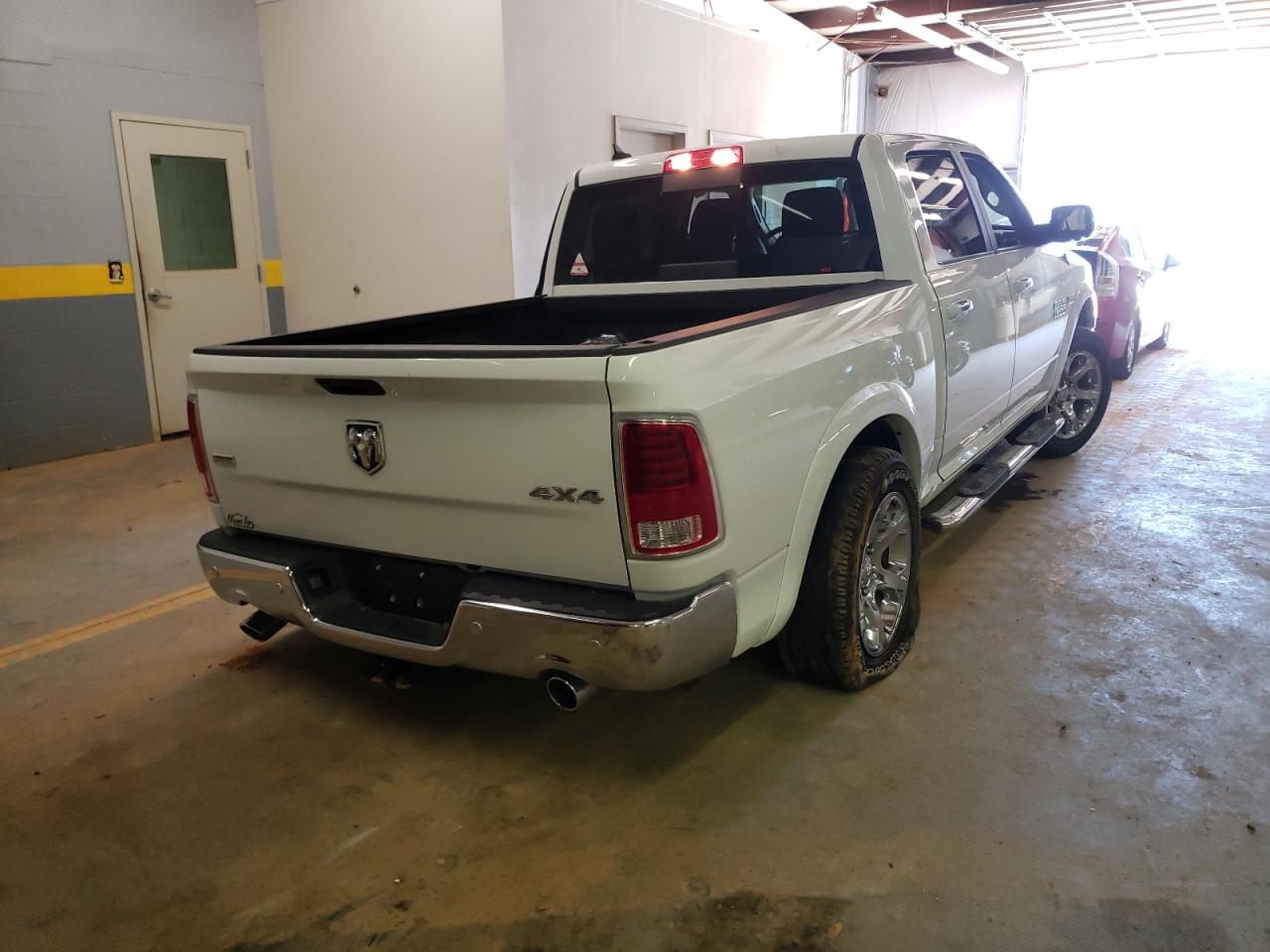 Photo 4 from auction – 2018 RAM 1500 LARAM with VIN 1C6RR7NT7JS233850