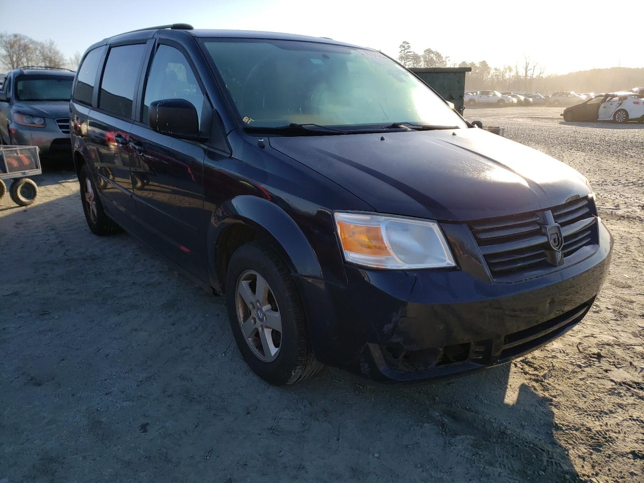 DODGE GRAND CARA 2010 with VIN 2D4RN3D17AR438070 - Photo from auction