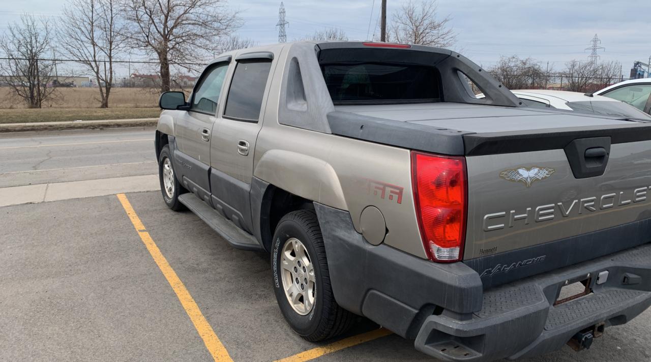 Photo 3 from auction – 2003 CHEVROLET AVALANCHE with VIN 3GNEC13T33G146909