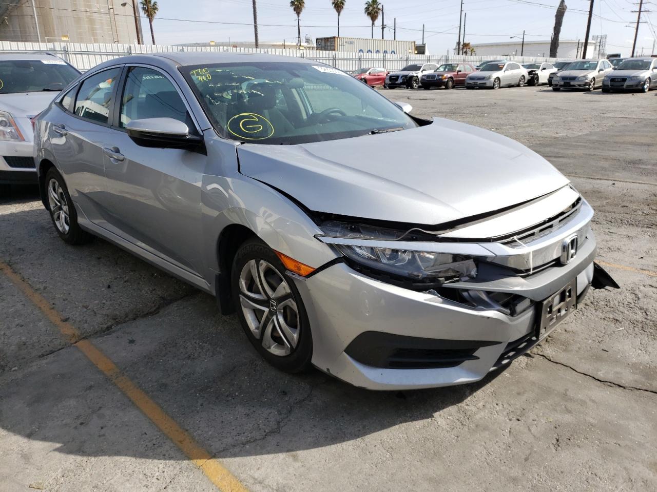 HONDA CIVIC LX 2017 with VIN 19XFC2F52HE203572 - Photo from auction
