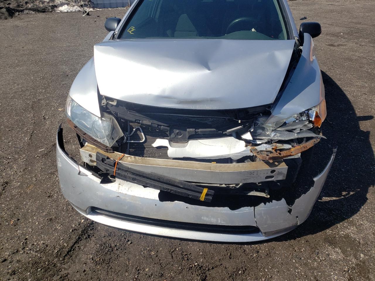 Photo 9 from auction – 2006 HONDA CIVIC DX with VIN 2HGFA15316H022918