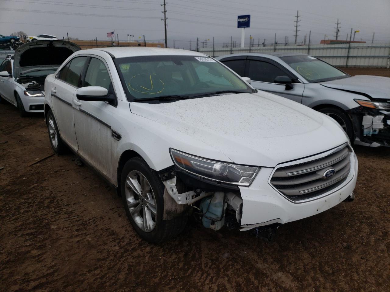 FORD TAURUS SEL 2015 with VIN 1FAHP2H82FG135491 - Photo from auction