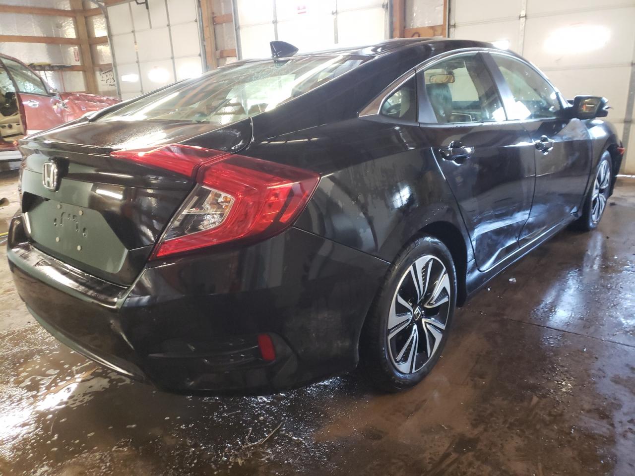 Photo 4 from auction – 2018 HONDA CIVIC EX with VIN JHMFC1F3XJX026024