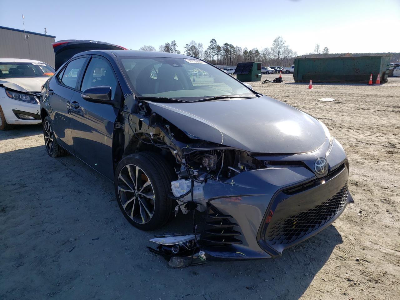 TOYOTA COROLLA L 2017 with VIN 5YFBURHE5HP671411 - Photo from auction