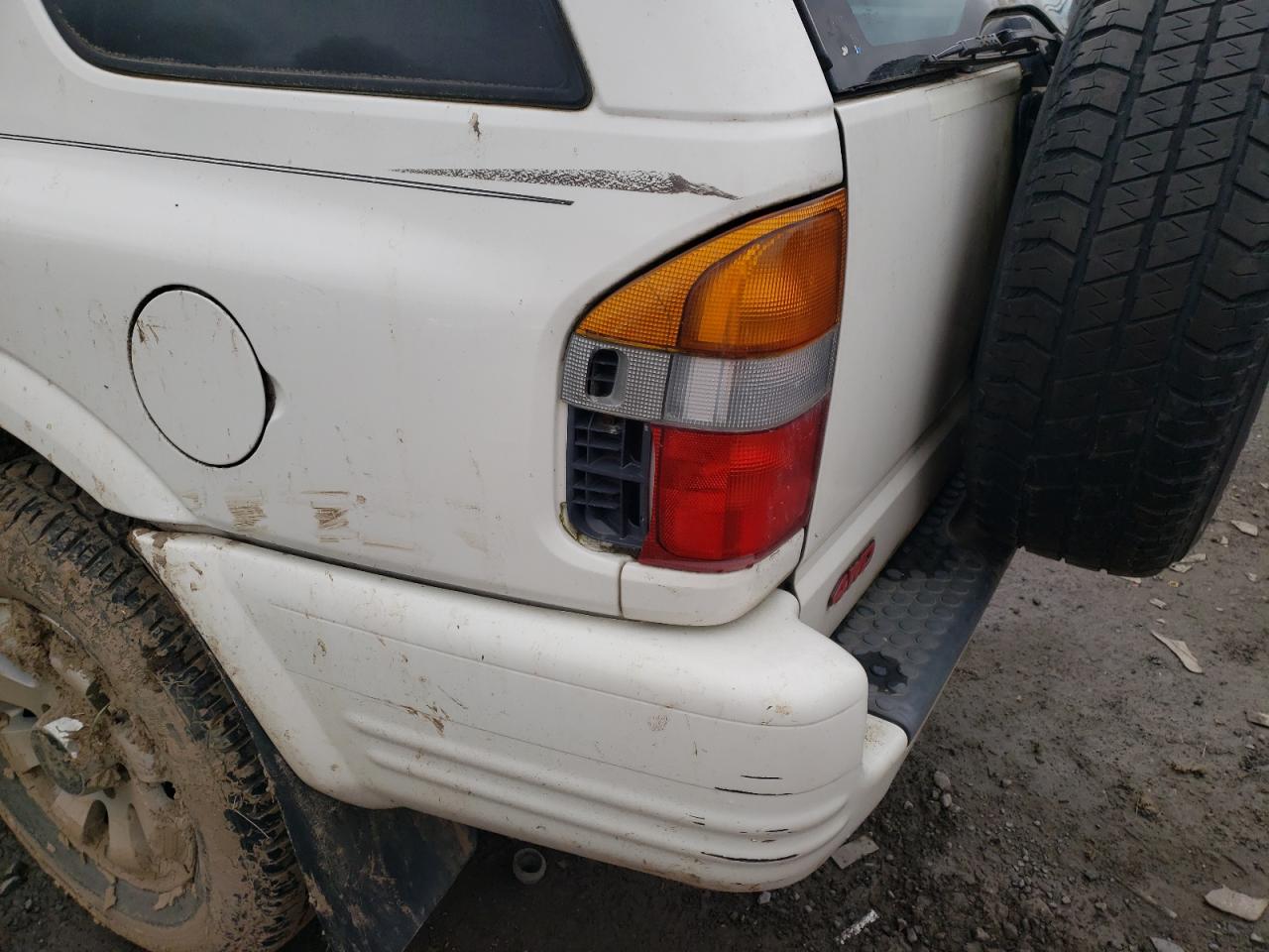 Photo 9 from auction – 1998 HONDA PASSPORT E with VIN 4S6CM58W5W4415097
