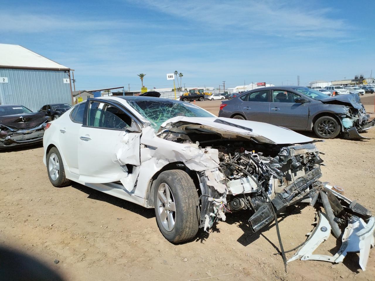 KIA OPTIMA LX 2015 with VIN KNAGM4A77F5633528 - Photo from auction