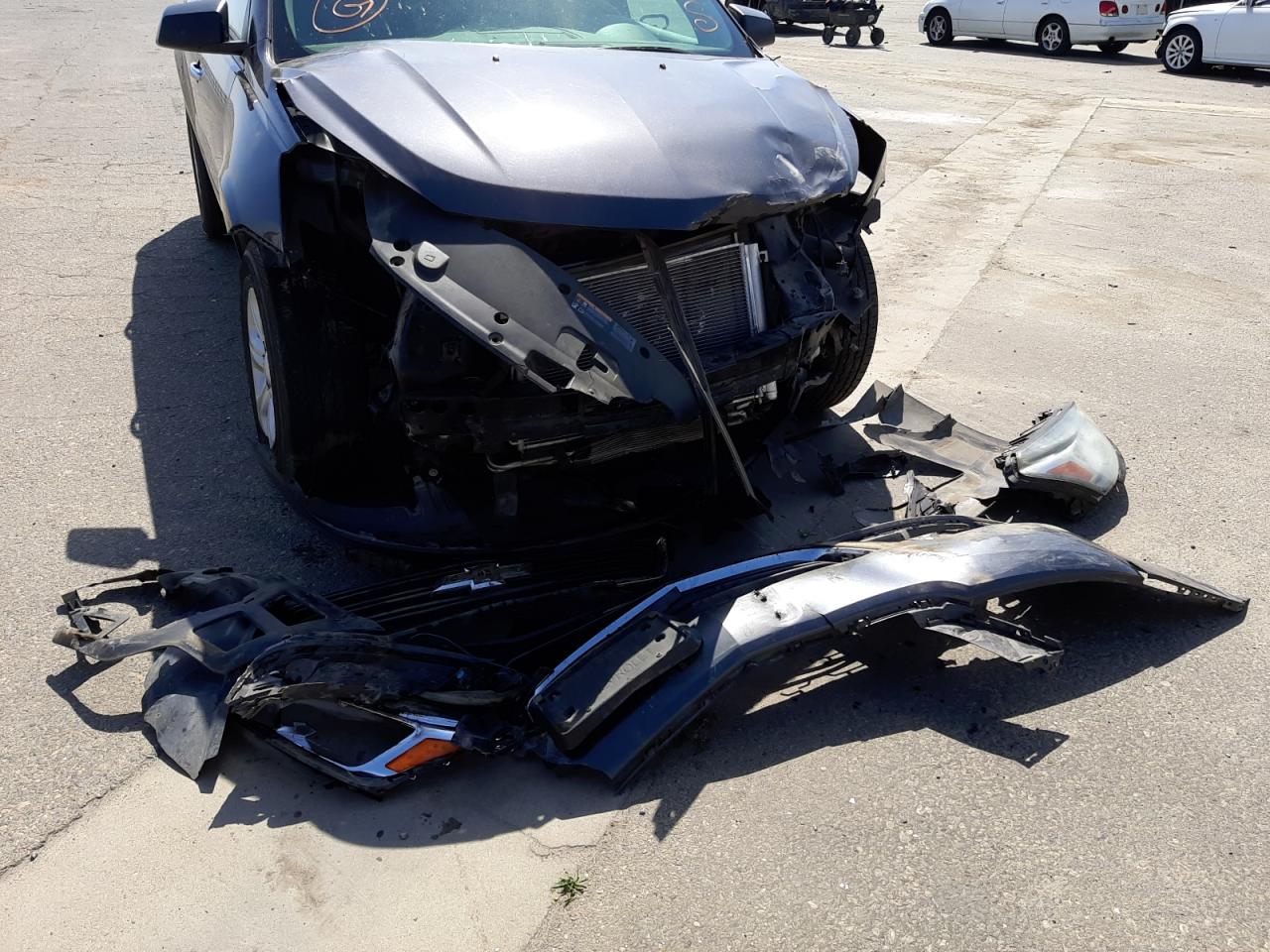 Foto 9 de la subasta – 2014 CHEVROLET TRAVERSE L con VIN 1GNKRFKD2EJ119159
