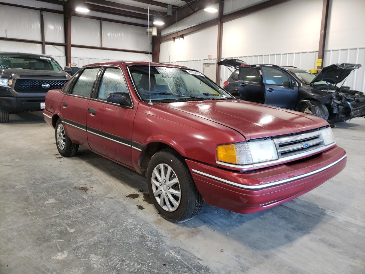 FORD TEMPO GL 1990 مع رقم تعريف المركبة 2FAPP36X7LB157422 - صورة من المزاد
