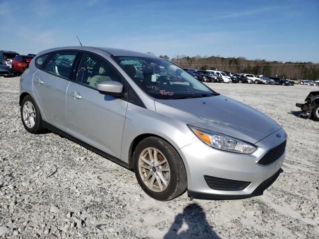 FORD FOCUS SE 2018 with VIN 1FADP3K28JL231179 - Photo from auction