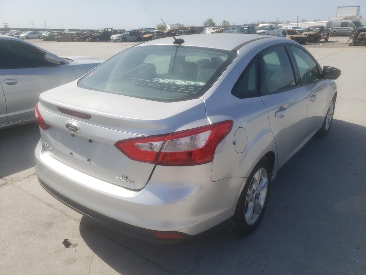 Photo 4 from auction – 2014 FORD FOCUS SE with VIN 1FADP3F20EL211699