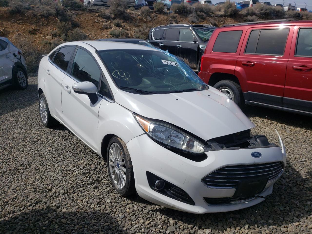 FORD FIESTA TIT 2014 with VIN 3FADP4CJ2EM134964 - Photo from auction