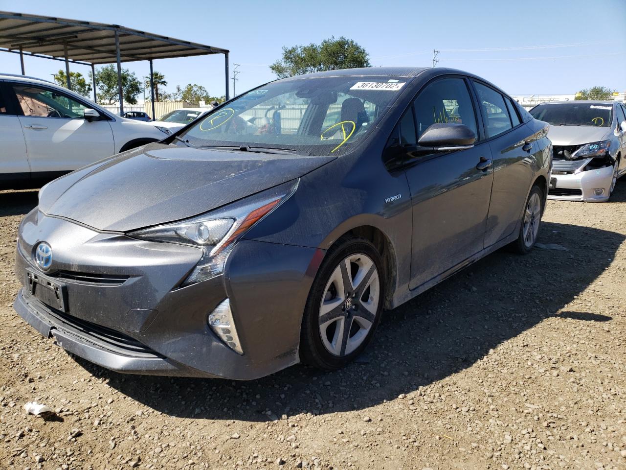 Photo 2 from auction – 2016 TOYOTA PRIUS with VIN JTDKARFU0G3014879