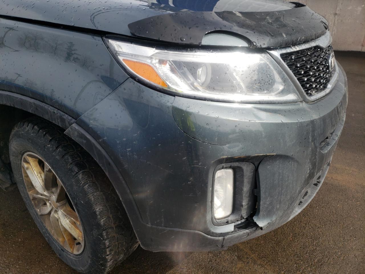 Photo 9 from auction – 2014 KIA SORENTO LX with VIN 5XYKT3A67EG523098