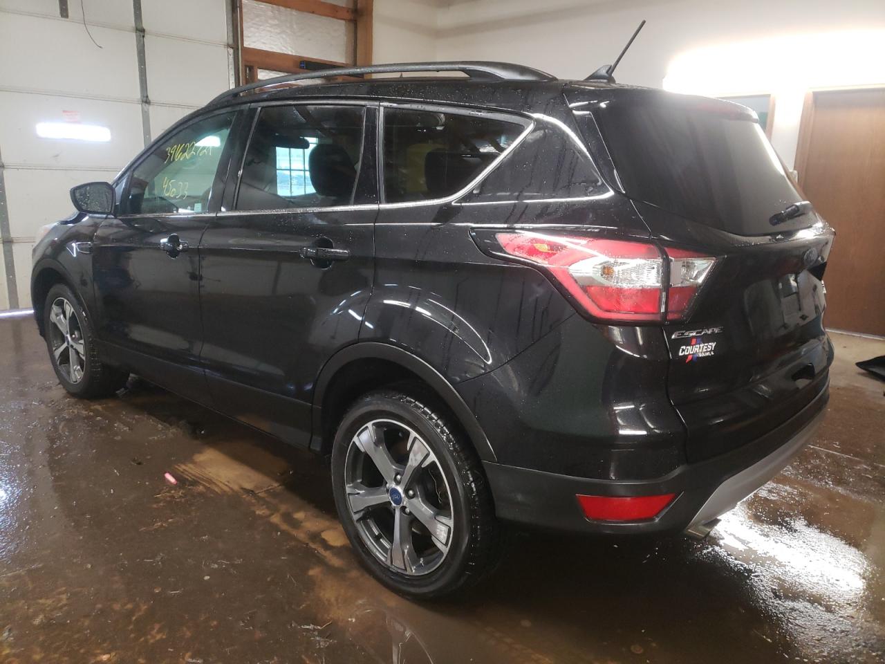 Photo 3 from auction – 2018 FORD ESCAPE SEL with VIN 1FMCU9HD7JUA50493