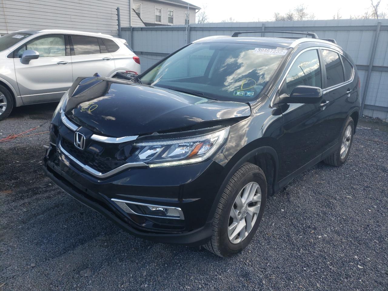 Photo 2 from auction – 2015 HONDA CR-V EXL with VIN 2HKRM4H72FH668690