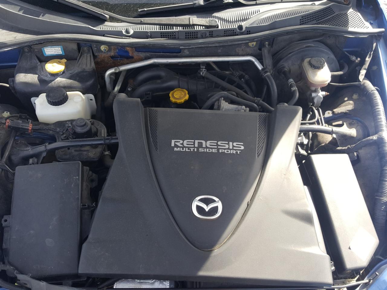 Photo 7 from auction – 2004 MAZDA RX8 with VIN JM1FE173140111504