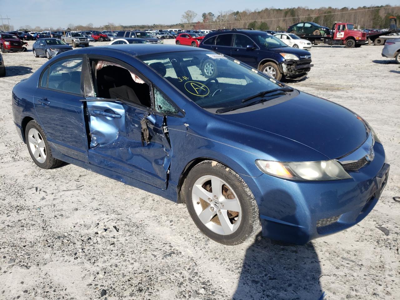HONDA CIVIC LX-S 2010 with VIN 19XFA1F63AE010572 - Photo from auction